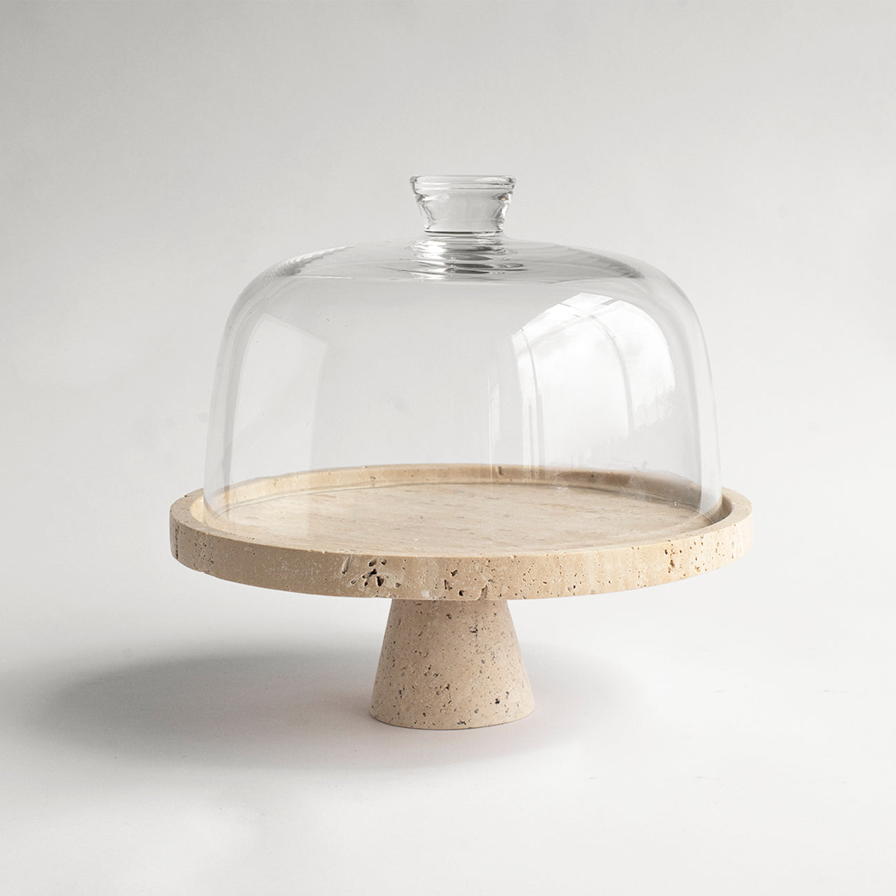 Travertine cake stand with natural stone base