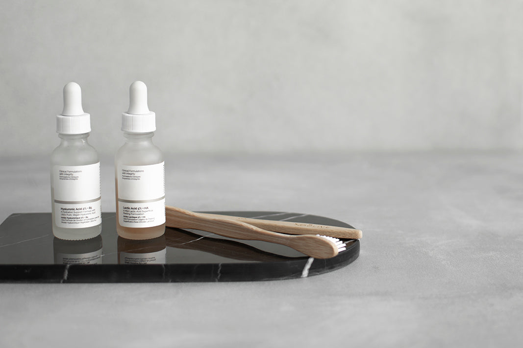 Black marble serving tray with arched shape and white veining