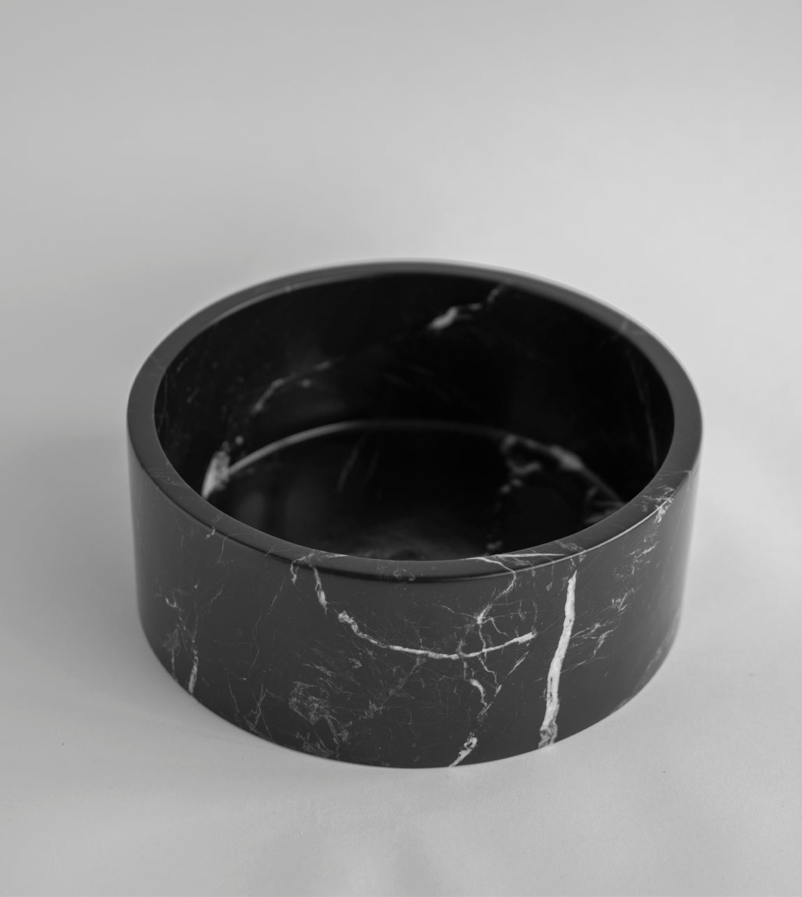 Black marble bowl with matte finish for home decor