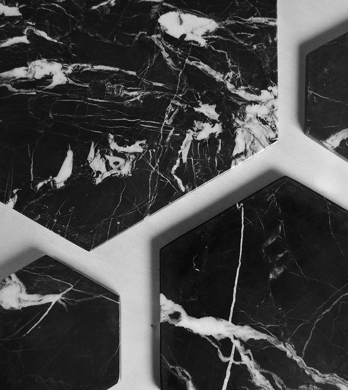 Black marble platter with hexagon shape for serving cheese