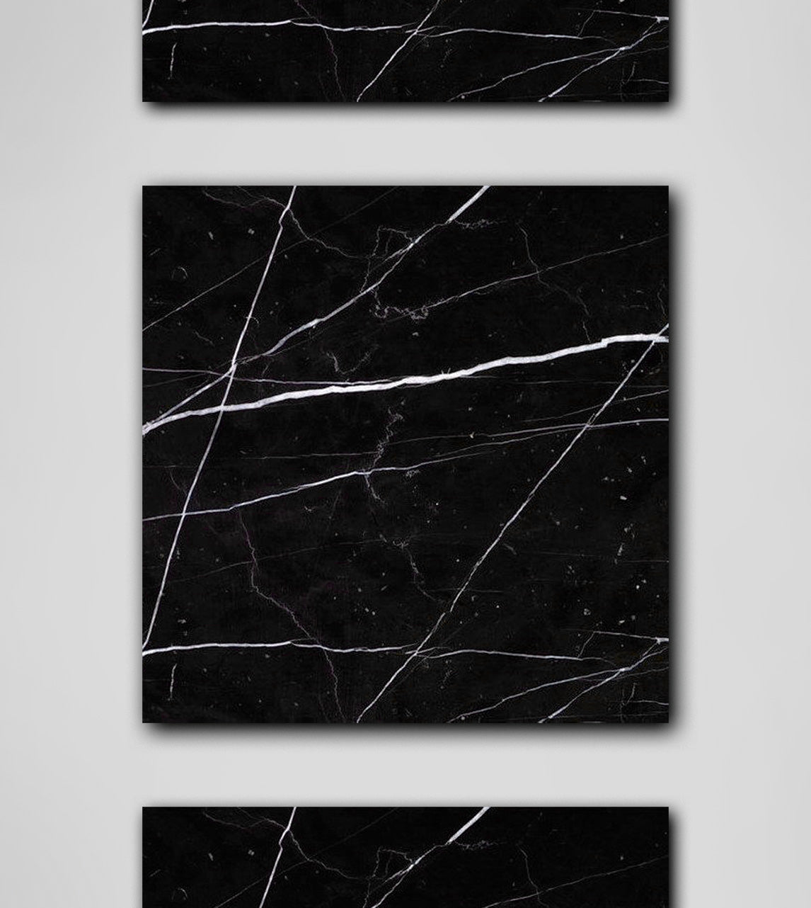 Black marble platter with white veining and square shape