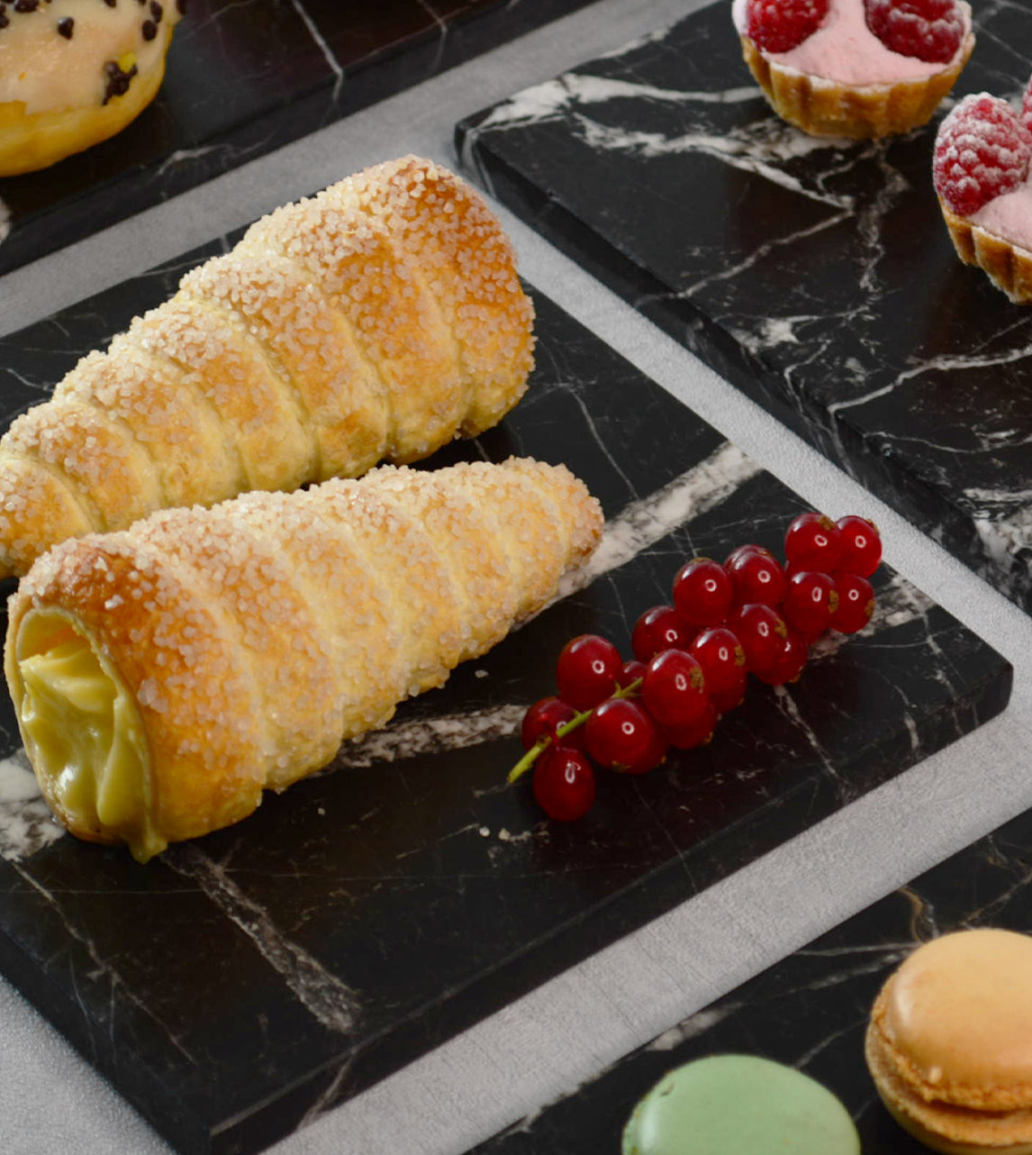 Black marble platter with white veining and square shape