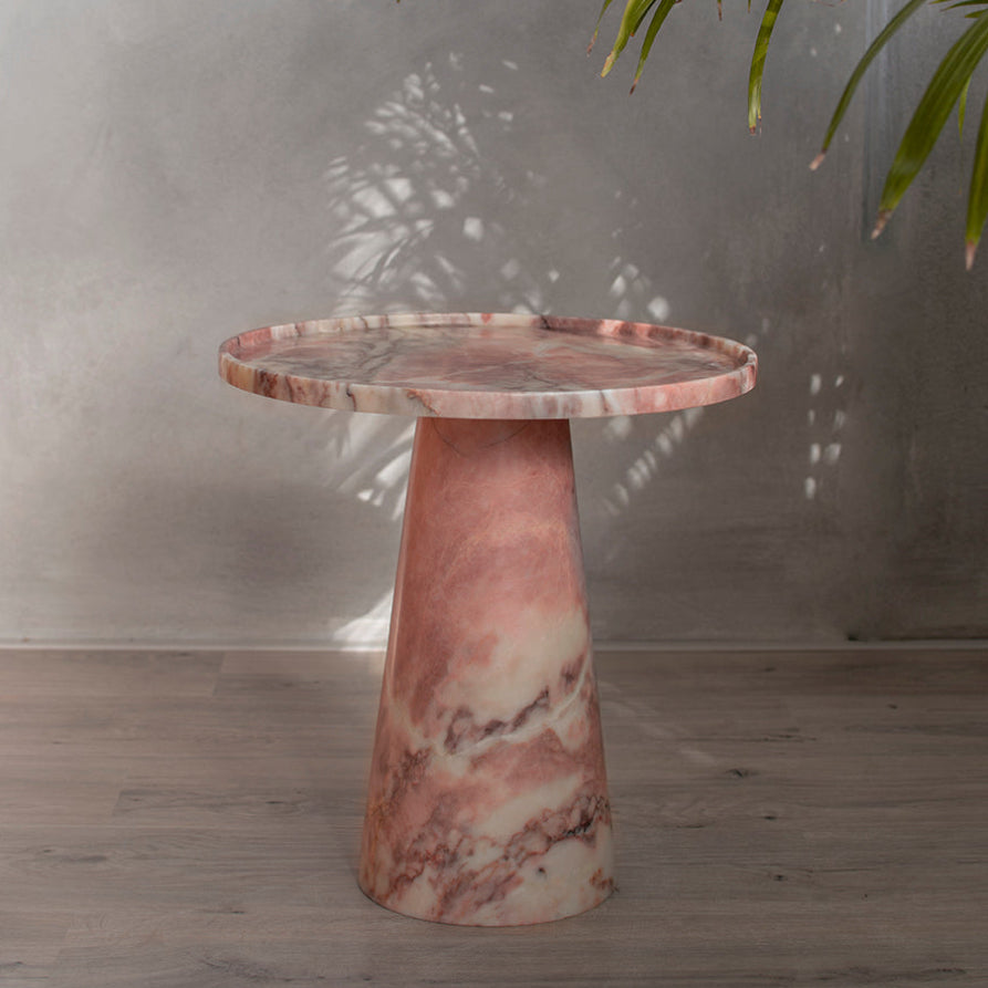 Pink marble cone side table with soft veining and round top