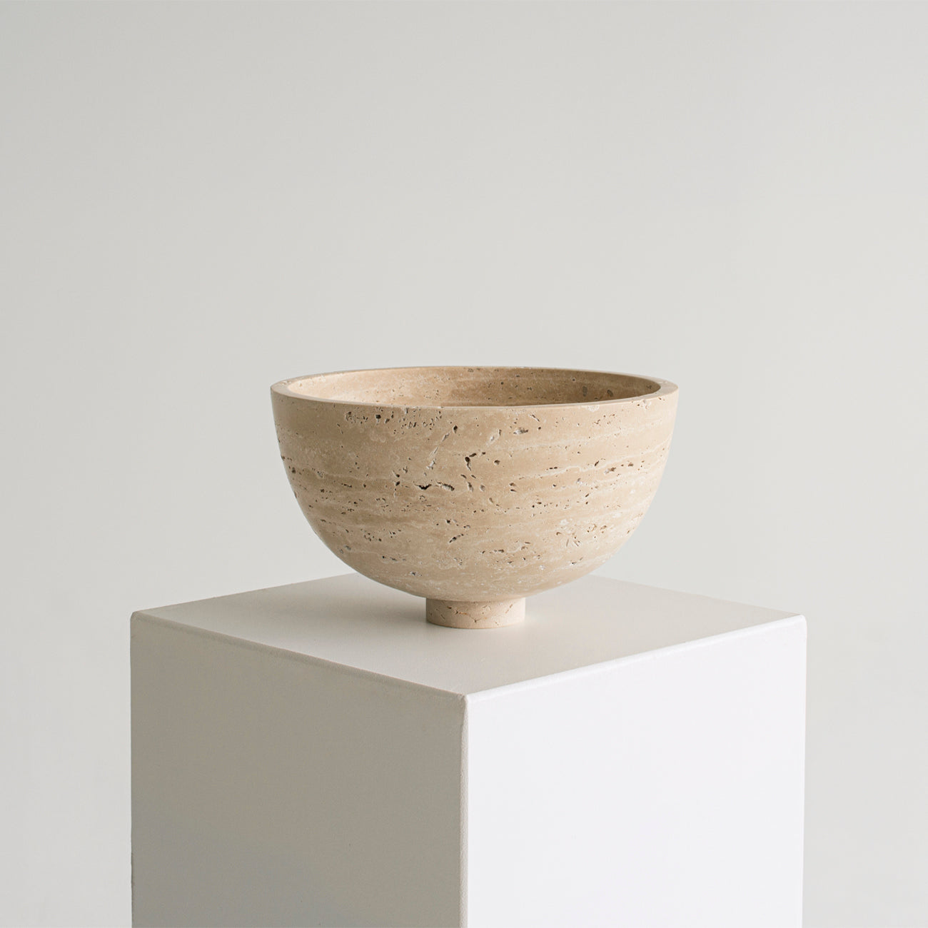 Travertine fruit bowl centerpiece with natural stone detail