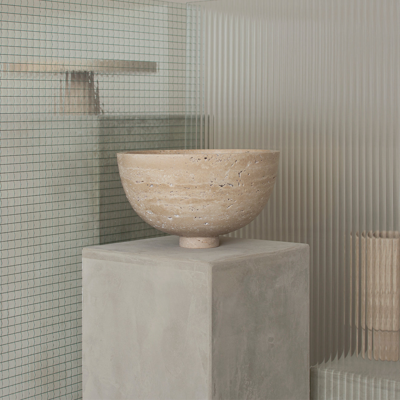 Travertine fruit bowl centerpiece with natural stone detail